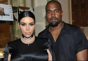 Kim Kardashian reveals she risks running into trouble with husband Kanye West over too many racy photos