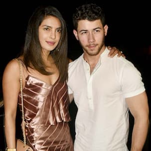 Nick Jonas didn't kiss Priyanka Chopra on their first night together at her apartment because Madhu Chopra was in the house - deets here