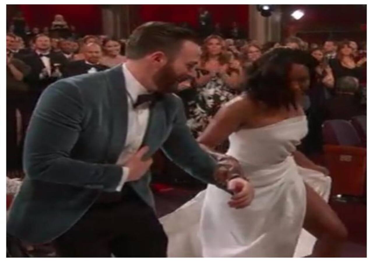 Chris Evans Helps Regina King to Oscars Stage and Twitter Is Loving It