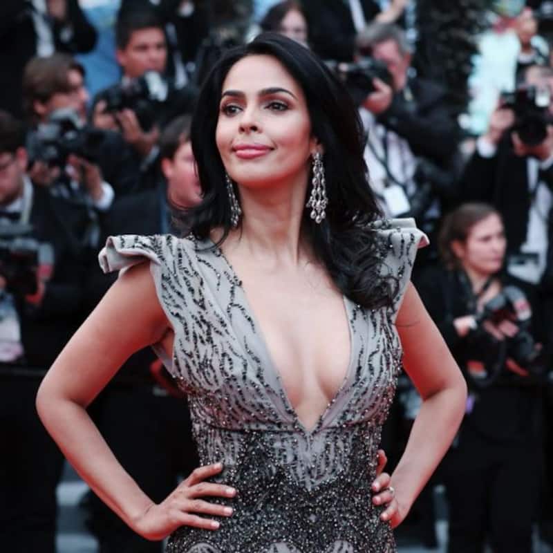 Cannes 2019: Mallika Sherawat joins PeeCee, Deepika and Kangana's league as she walks the red carpet in an ash-colored embellished gown