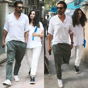 Soon-to-be parents Arjun Rampal and Gabriella Demetriades twinned in white for a clinic visit - view pics