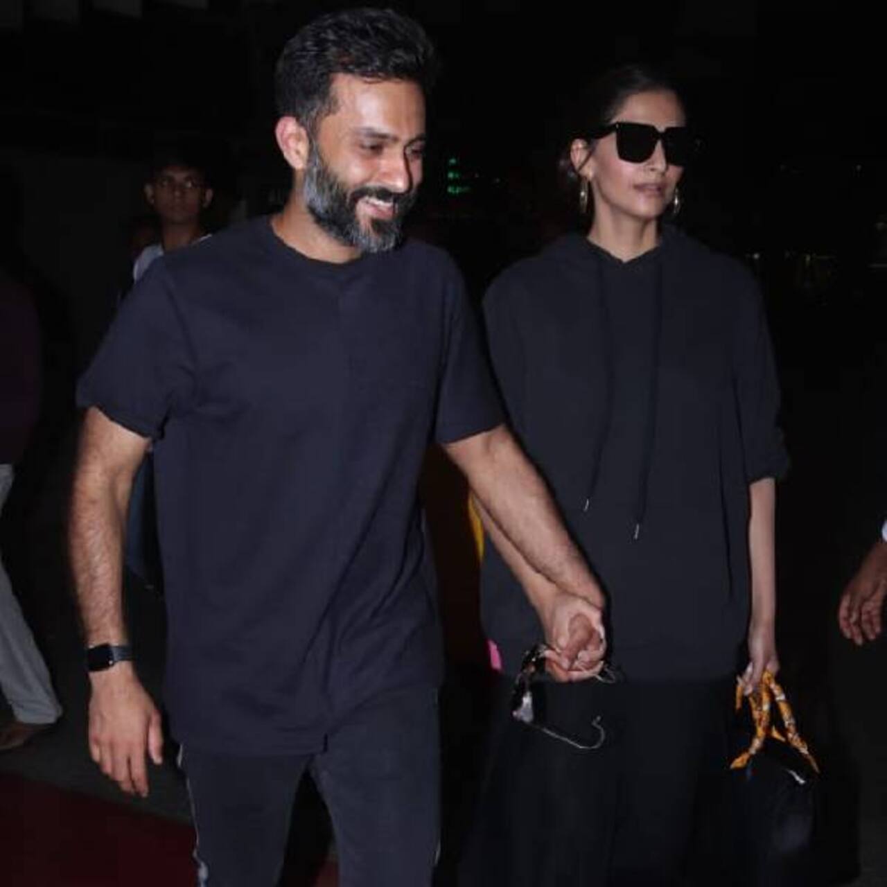 Sonam Kapoor and Anand Ahuja twin in black as they return to Mumbai ...