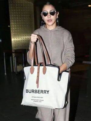Anushka Sharma flaunts a costly Burberry handbag worth Rs 92,000 at the airport!