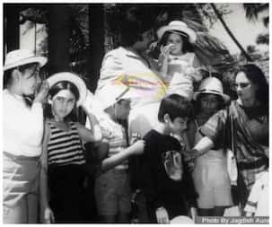 Amitabh Bachchan and Jaya Bachchan have a bunch of kids around them in this throwback pic - can you guess the stars?