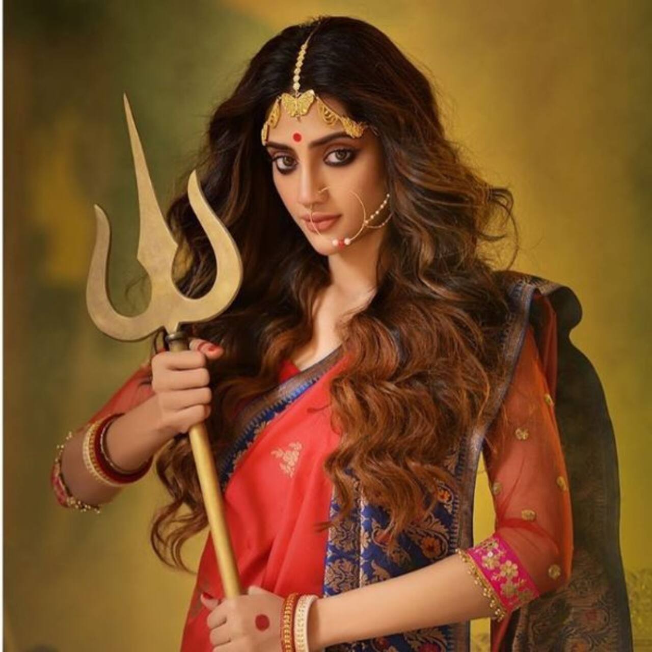 Bengali film actress and MP Nusrat Jahan issued death threats after posing as Goddess Durga; called 'evil', 'bit*h' and other vile names