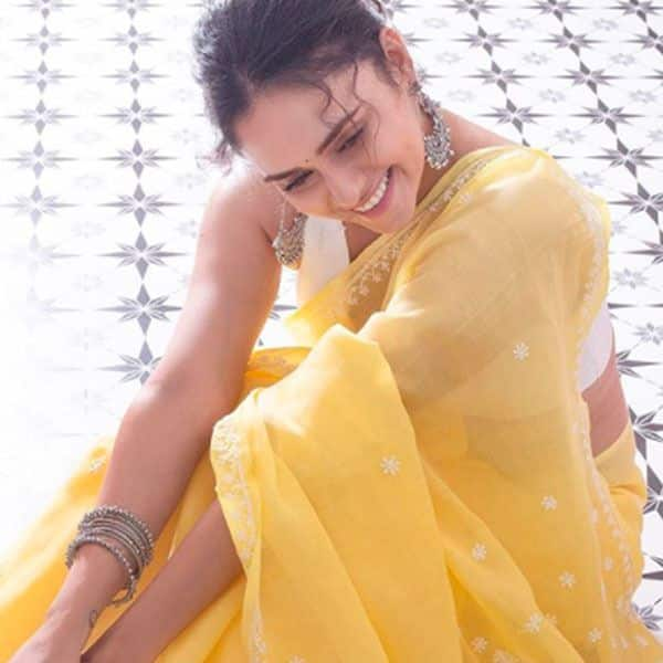 Amruta Khanvilkar In Kalki Grey Sheer Net Saree With Floral Embroidered  Butti | hirevirtualexperts.com