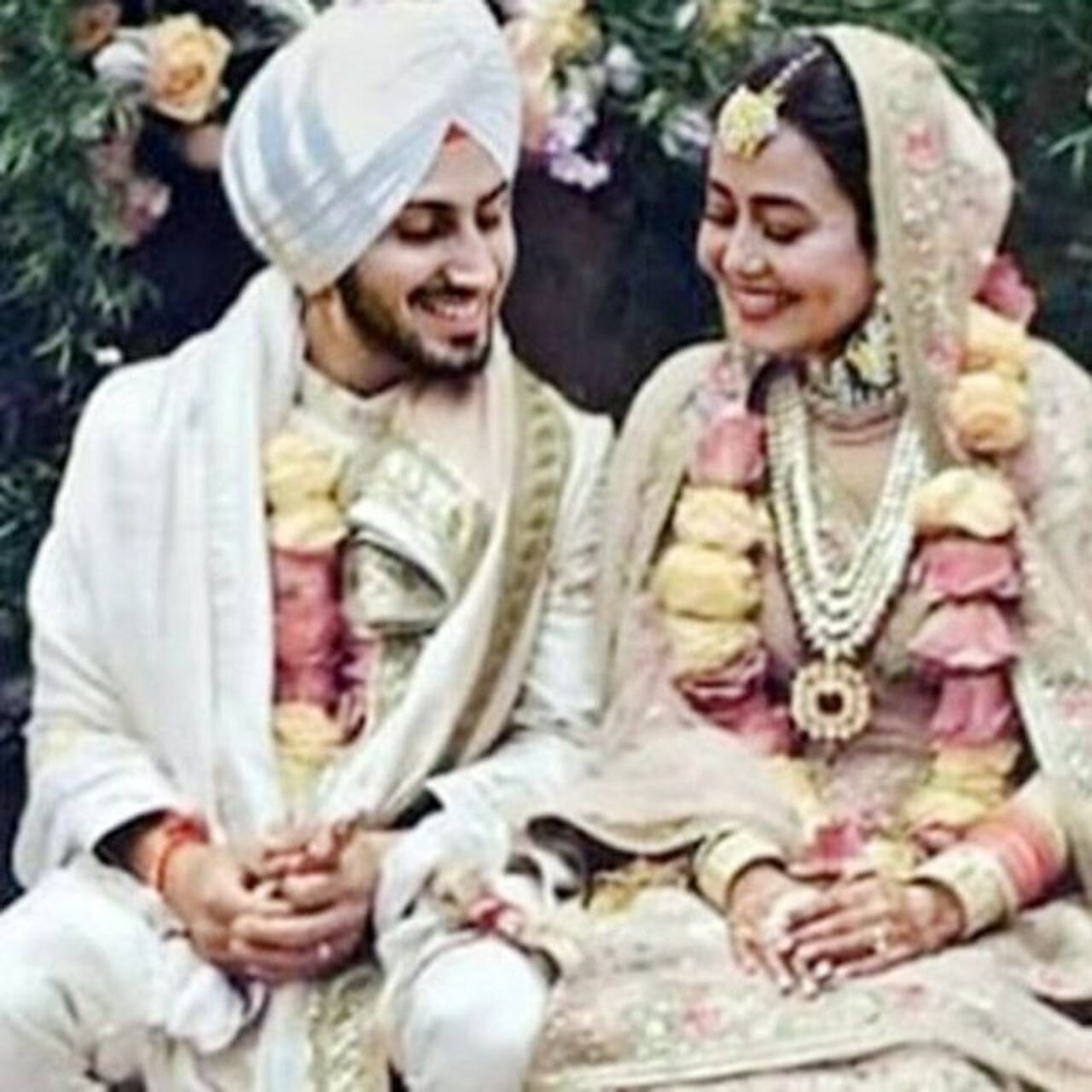 First Pics Neha Kakkar And Rohanpreet Singhs Wedding Look Will Remind You Of Virushka