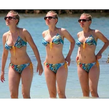 Johansson giving us major beach and bikini - view pics
