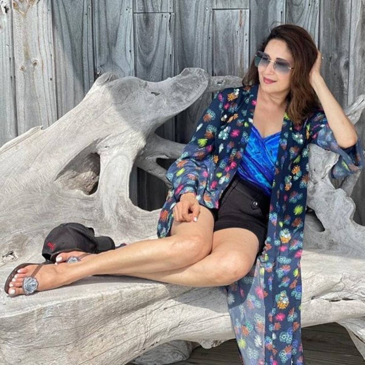 Madhuri Dixit Makes Our Heart Go Dhak Dhak As She Poses In Red Swimsuit In The Maldives — View 