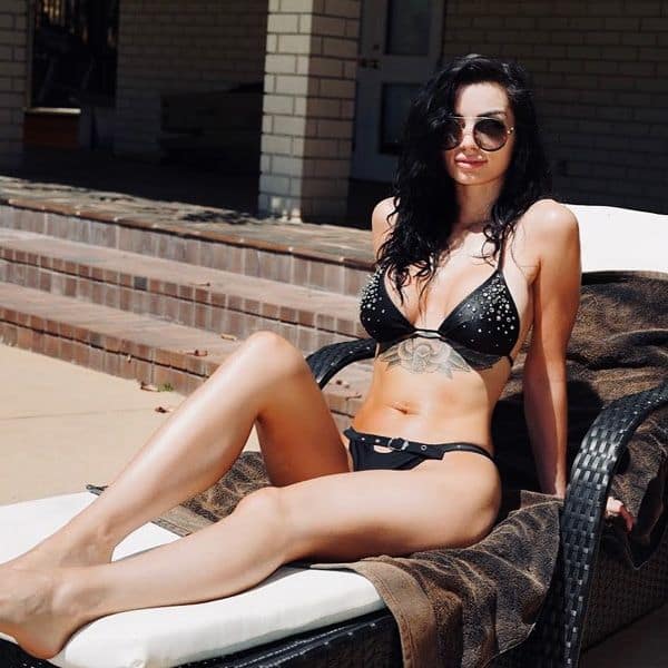 WWE wrestler Paige flaunts her wild side in these throwback bikini