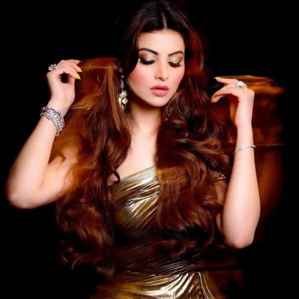 Urvashi Rautela's dazzling look in a metallic gold dress gets a thumbs up  from the fashion police  view pics