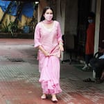 Just 5 clicks of Sara Ali Khan saving her dainty outfit from the rain puddles that are relatable AF — view pics