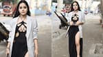 Urfi Javed stuns in black cutout thigh-high slit gown; refuses to smile while posing says 'smile does not go with this look'  – watch video