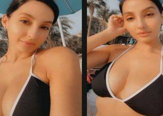 Nora Fatehi stuns in a bikini as she chills on a Dubai beach after testing COVID negative – see pic