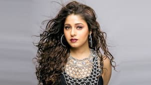 Sunidhi Chauhan reacts to being attacked with a water bottle thrown at her during live concert