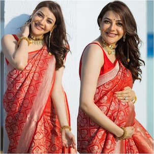 Kajal Aggarwal flaunts baby bump in a red saree; fans call her 'gorgeous' – View Pics
