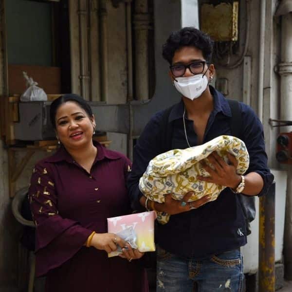 हर्ष लिंबाचिया की गोद में बच्चा