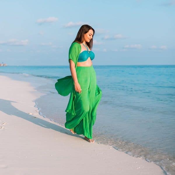Sonakshi Sinha gives fans a teasing glimpse of her chic swimwear as she ...