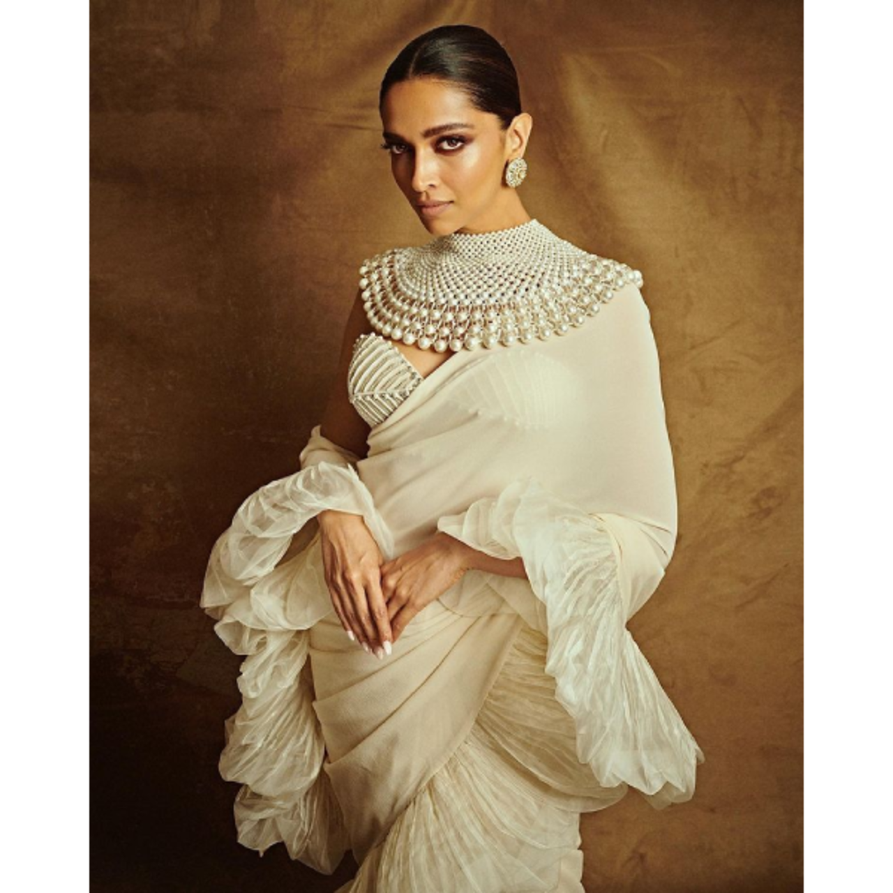 Deepika Padukone in off-white saree