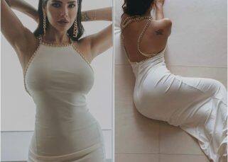 Aashram 3 hottie Esha Gupta flaunts her perfect hourglass figure in a white bodycon outfit [View Pics]