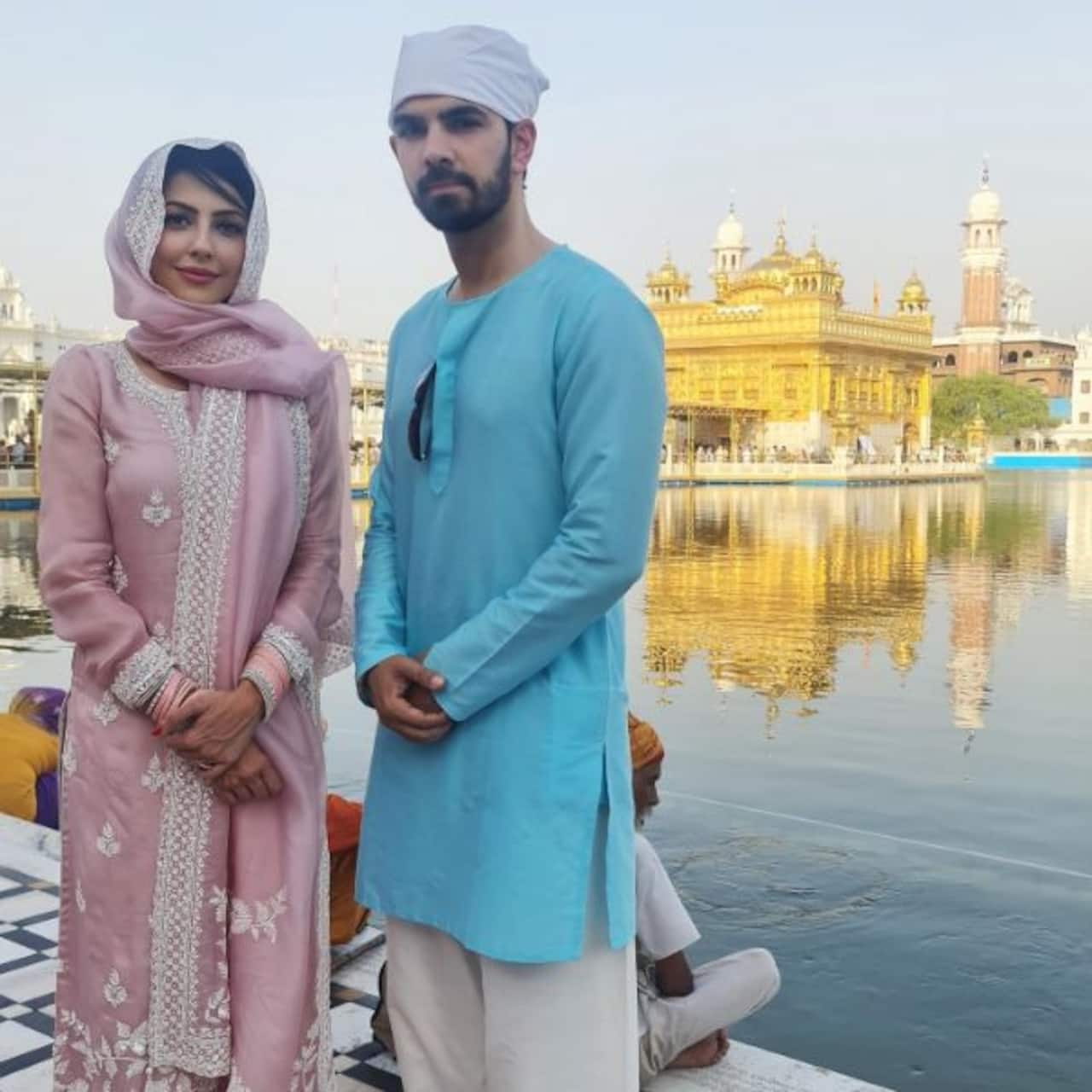 Newly wed couple Karan V Grover and Poppy Jabbal visit Golden Temple to