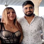 Rakhi Sawant claims her boyfriend doesn't like cleavage showing dresses; netzines says, 'Ab toh burka bhi pehenayega tera Adil'