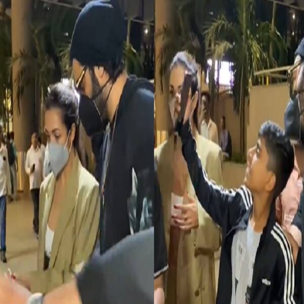 Arjun Kapoor protects Malaika Arora from the crowd as they make way at the airport after their Paris vacation: proves to be the best boyfriend again