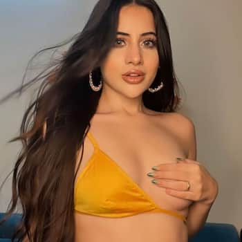 When Urfi Javed laid a mesh over her breasts  Urfi Javed covers her breast  with just her hand; check her boldest ever pics that left several jaws  dropped Photogallery at