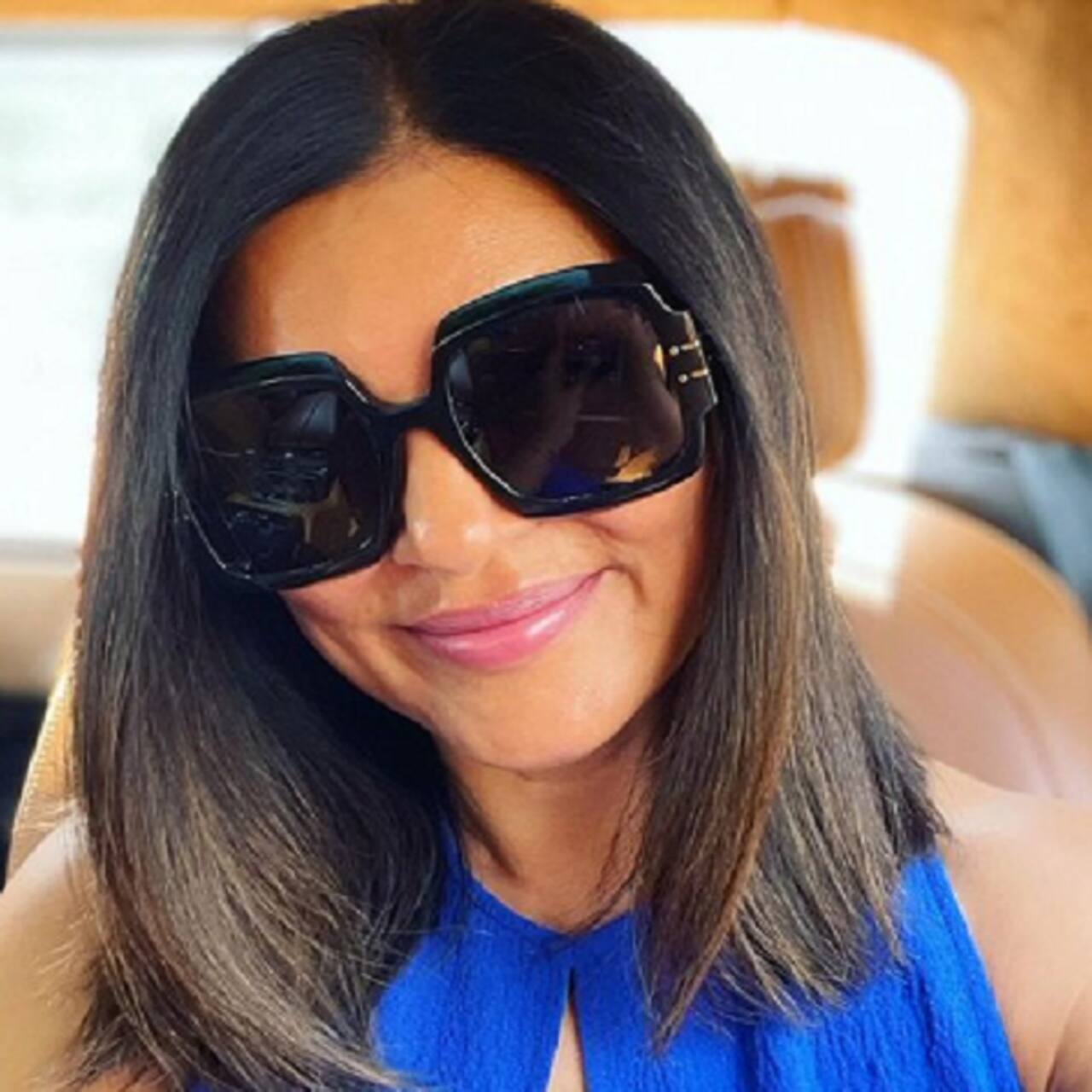 Sushmita Sen trolled for her happy selfie after netizens spot a vodka bottle in her car
