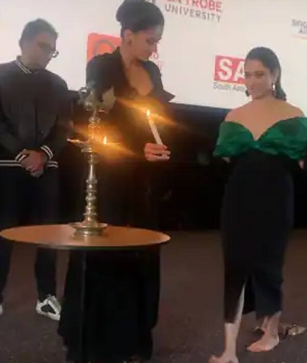 Tamannaah removes shoes to light a lamp at the Indian film festival of Melbourne