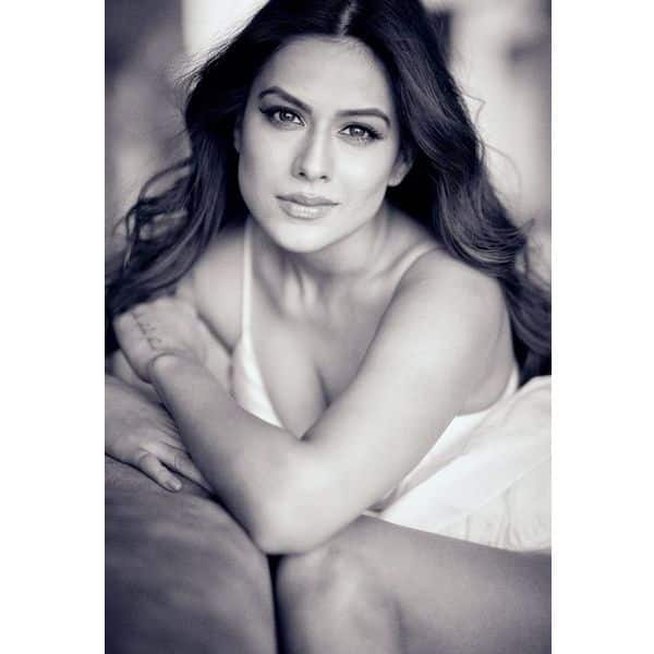 Nia Sharma – negligee monochromatic sizzler Nia Sharma in a negligee is pure hotness, and in monochrome, it's hotness escalated to infinity.
