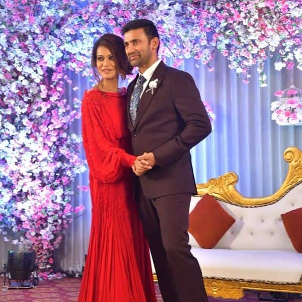 Payal and Sangram pose hand-in-hand