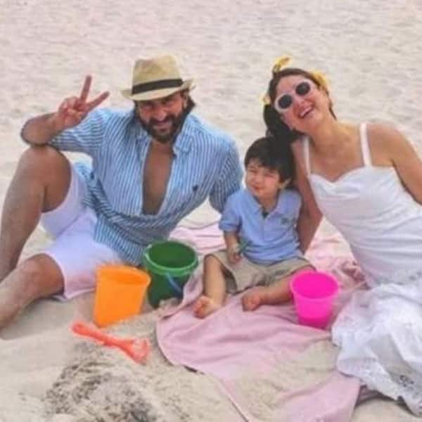 Saif Ali Khan and Kareena Kapoor Khan pose on the beach with their son Taimur