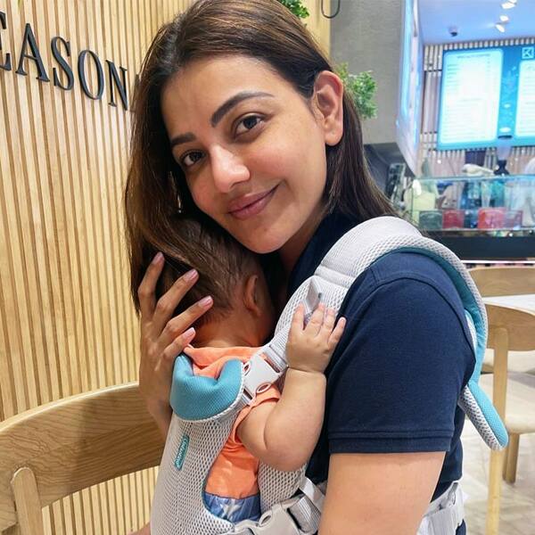Kajal Aggarwal holds her baby