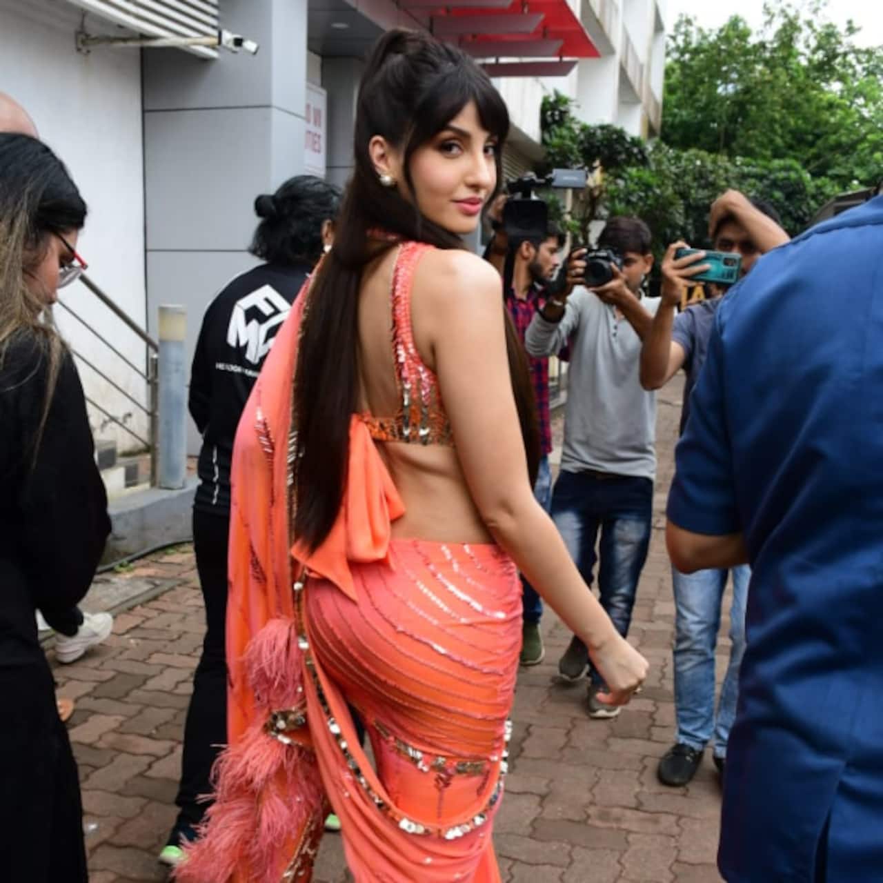 Nora Fatehi flaunts her curvy figure in front cut tight dress, people ...