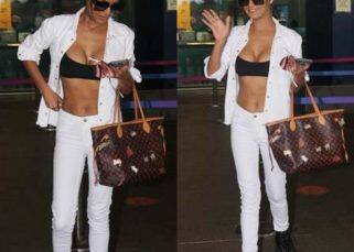 Poonam Pandey adds the hottest tadka to airport fashion in deep neck sports bra [View Pics]