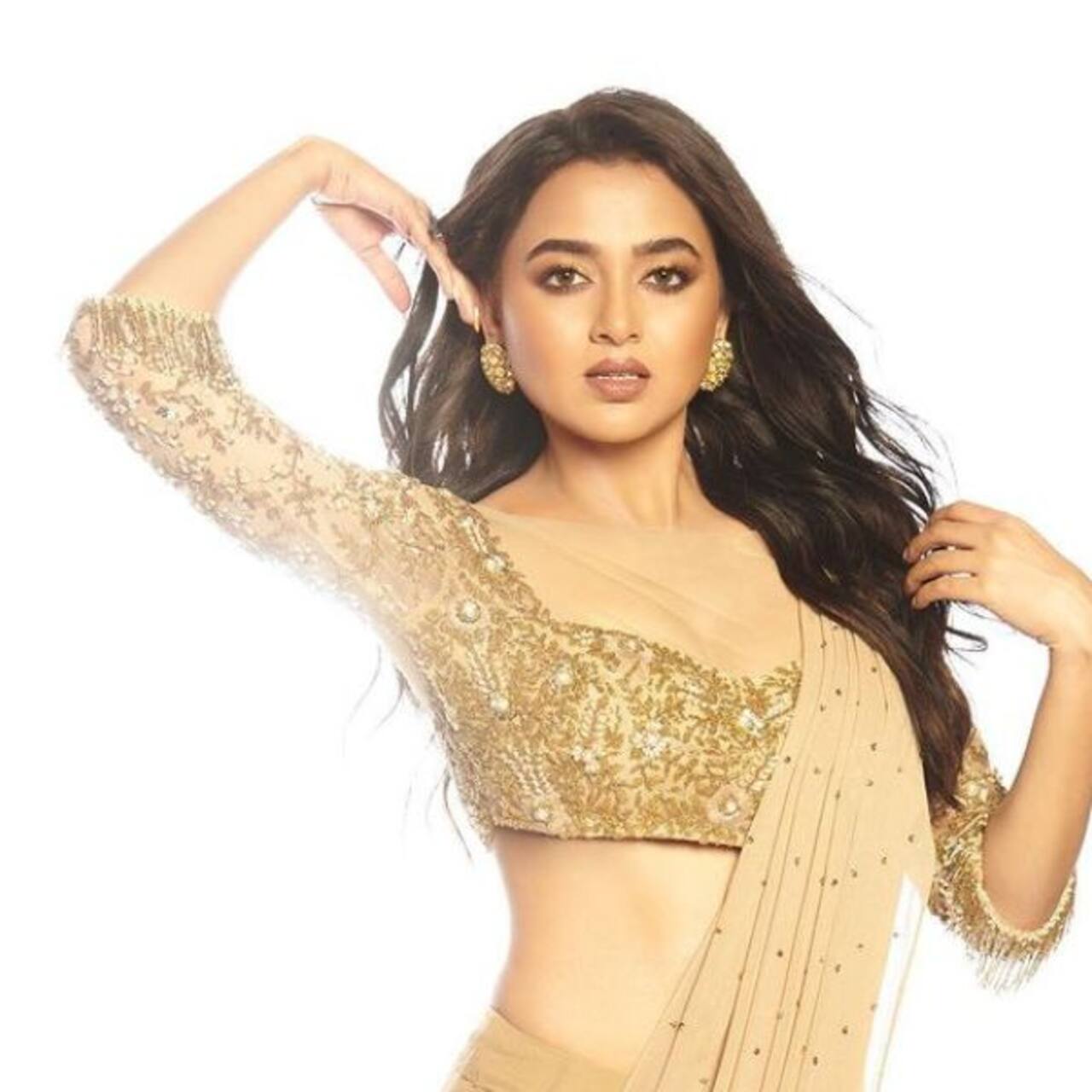 Bigg Boss 15 Winner Tejasswi Prakash Dazzles In A Black Shimmer Saree