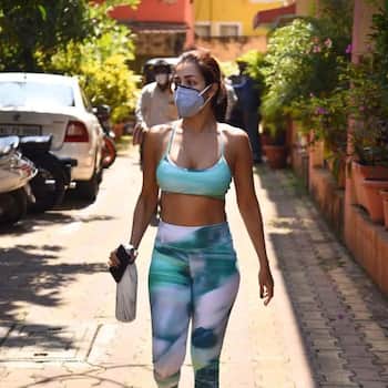 Malaika Arora in sports bra and joggers mixes gym fashion with airport  look. See pics - India Today