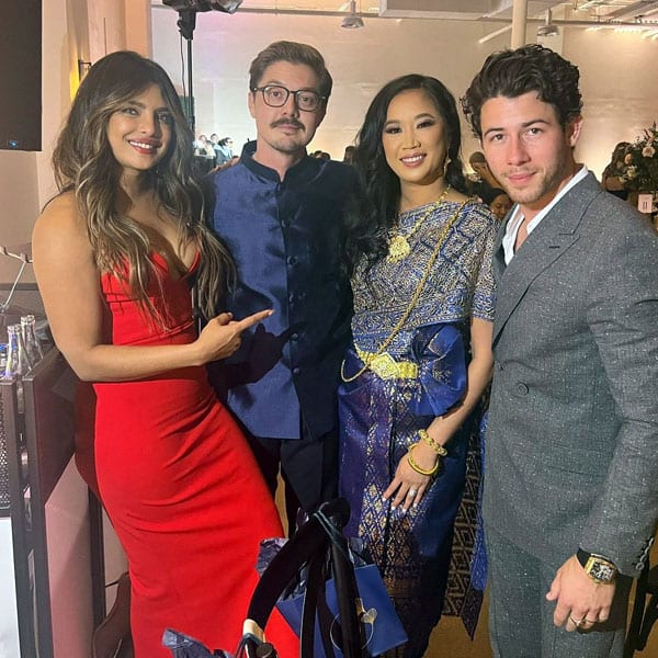 Priyanka Chopra and Nick Jonas pose with their friends