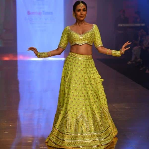 Malaika Arora walks the ramp at a fashion show