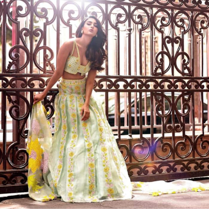 TV actresses in lehengas for sangeet night inspiration: Erica Fernandes in floral 