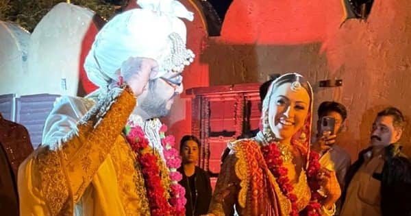 Bride and groom flaunt radiant smiles wearing varmalas in first picture and videos