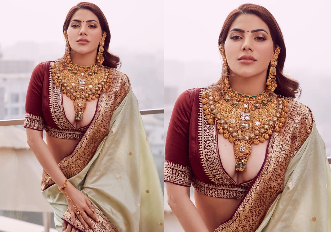 Nikki Tamboli looks super hot in a traditional saree | Bigg Boss 14 fame Nikki Tamboli takes risque to another level in traditional saree photoshoot; actress' daring blouse gets extreme reactions [View
