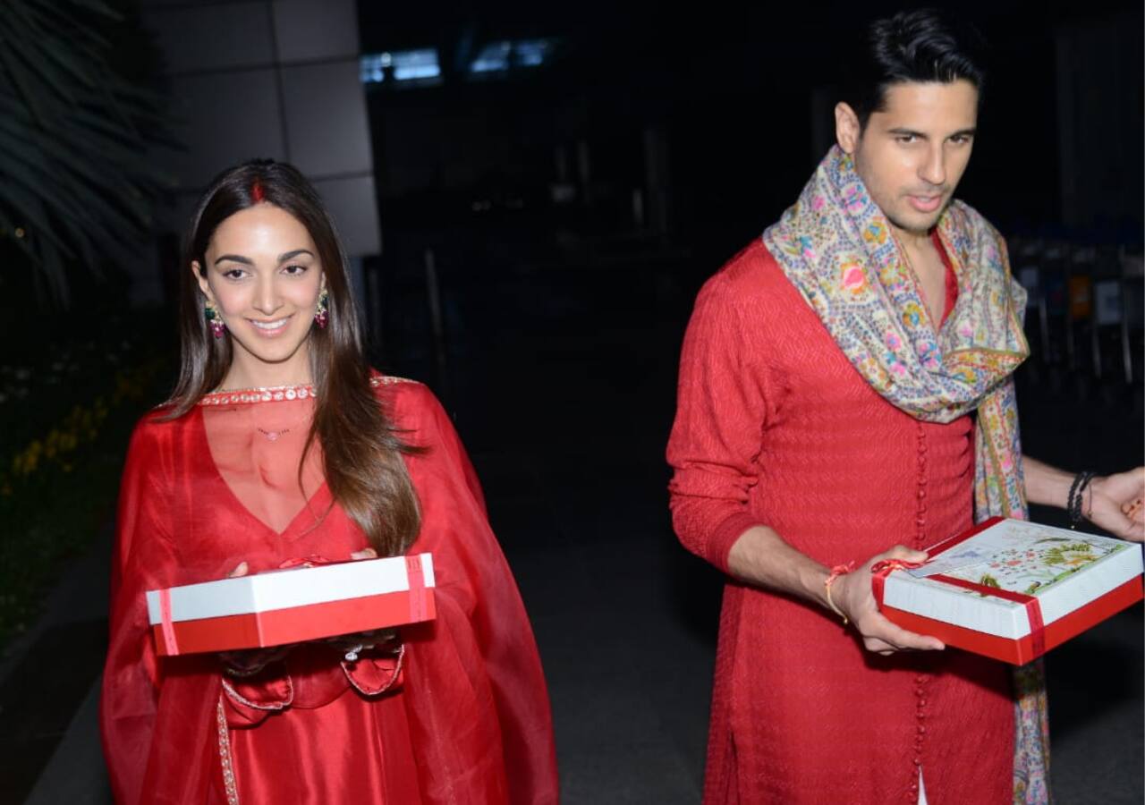 Sidharth Malhotra and Kiara Advani distribute sweets to paparazzi 