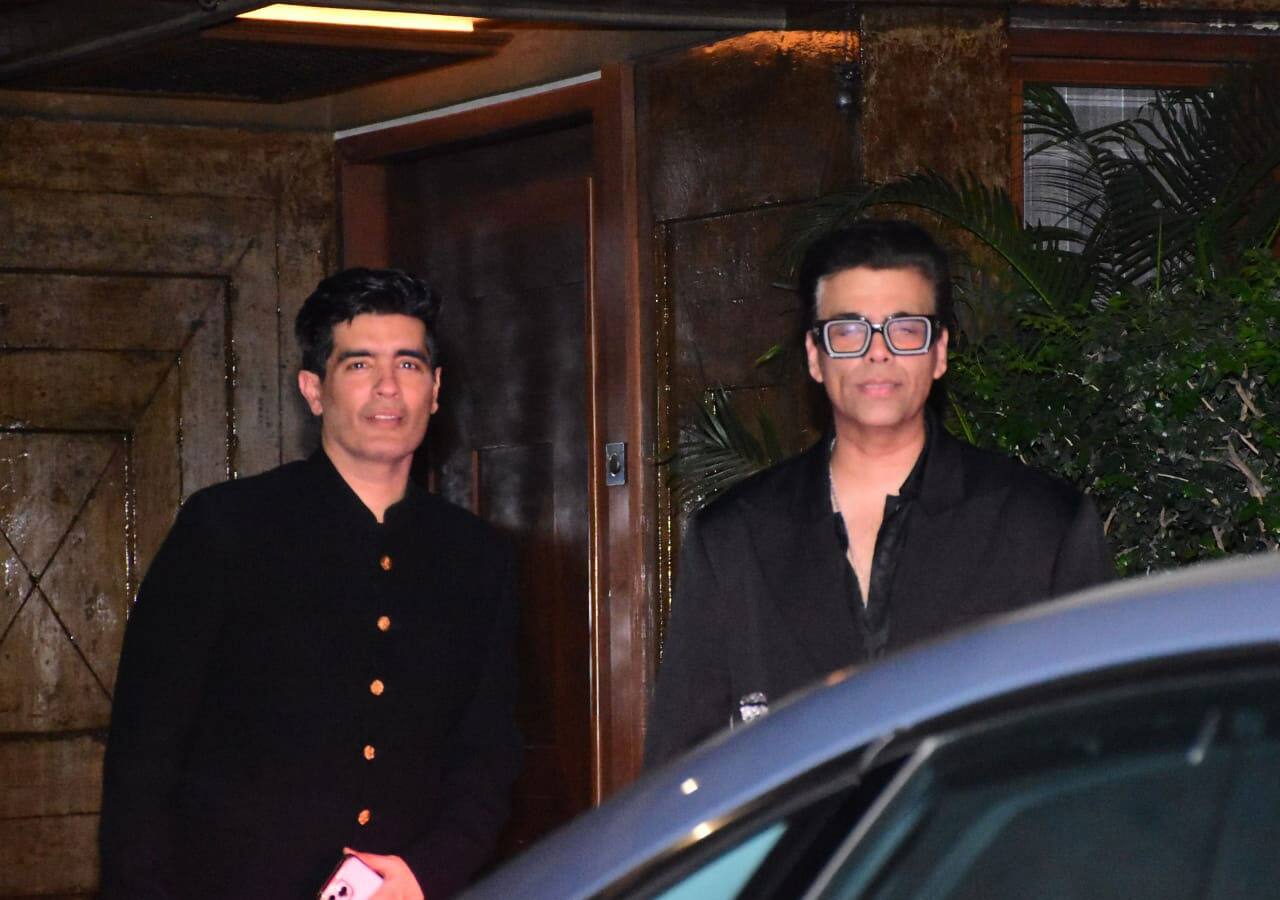 Karan Johar's style game is up to the mark as he poses with Manish Malhotra
