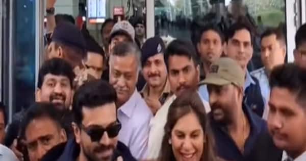 Ram Charan protects pregnant wife Upasana from a huge crowd as fans go berserk seeing them return after Oscars 2023 win [Watch video]