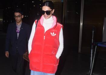 IN PICS: Deepika Padukone oozes oomph as she arrives wearing an oversized  camo jacket at the airport