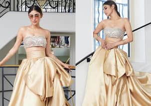 Cannes 2023: Mouni Roy works every bit of a dull gold skirt with a big bow; Arjun Bijlani, Aashka Goradia and others send love