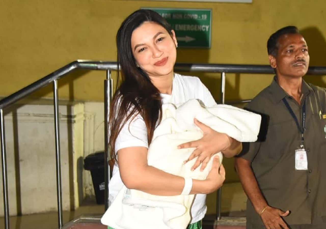 Gauahar Khan cannot stop smiling while holding her newborn.