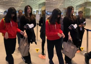 Aishwarya Rai gets snapped with Aaradhya, Abhishek Bachchan at airport,  makes a statement in Rs 2.2 lakh bag, WATCH